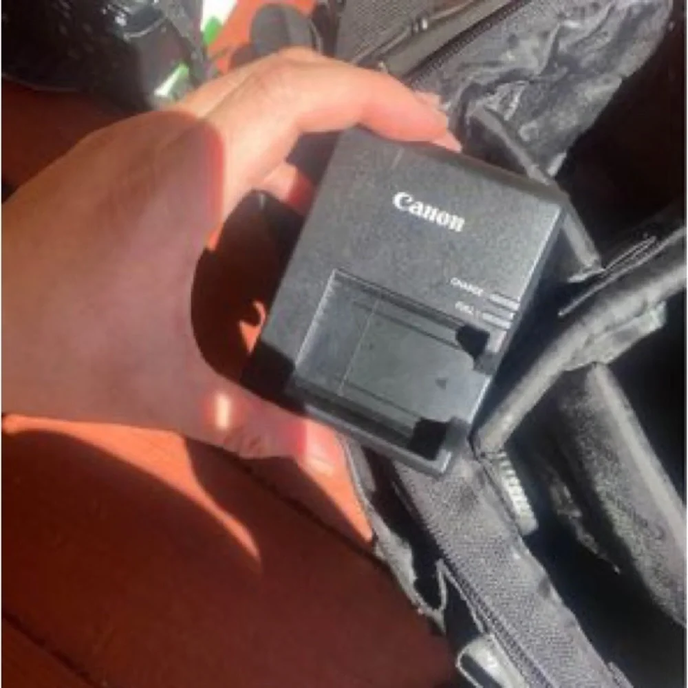 Canon Rebel EOS T3 Camera, Rebel Gadget Bag, Battery Charger, extra 55-25mm lens
